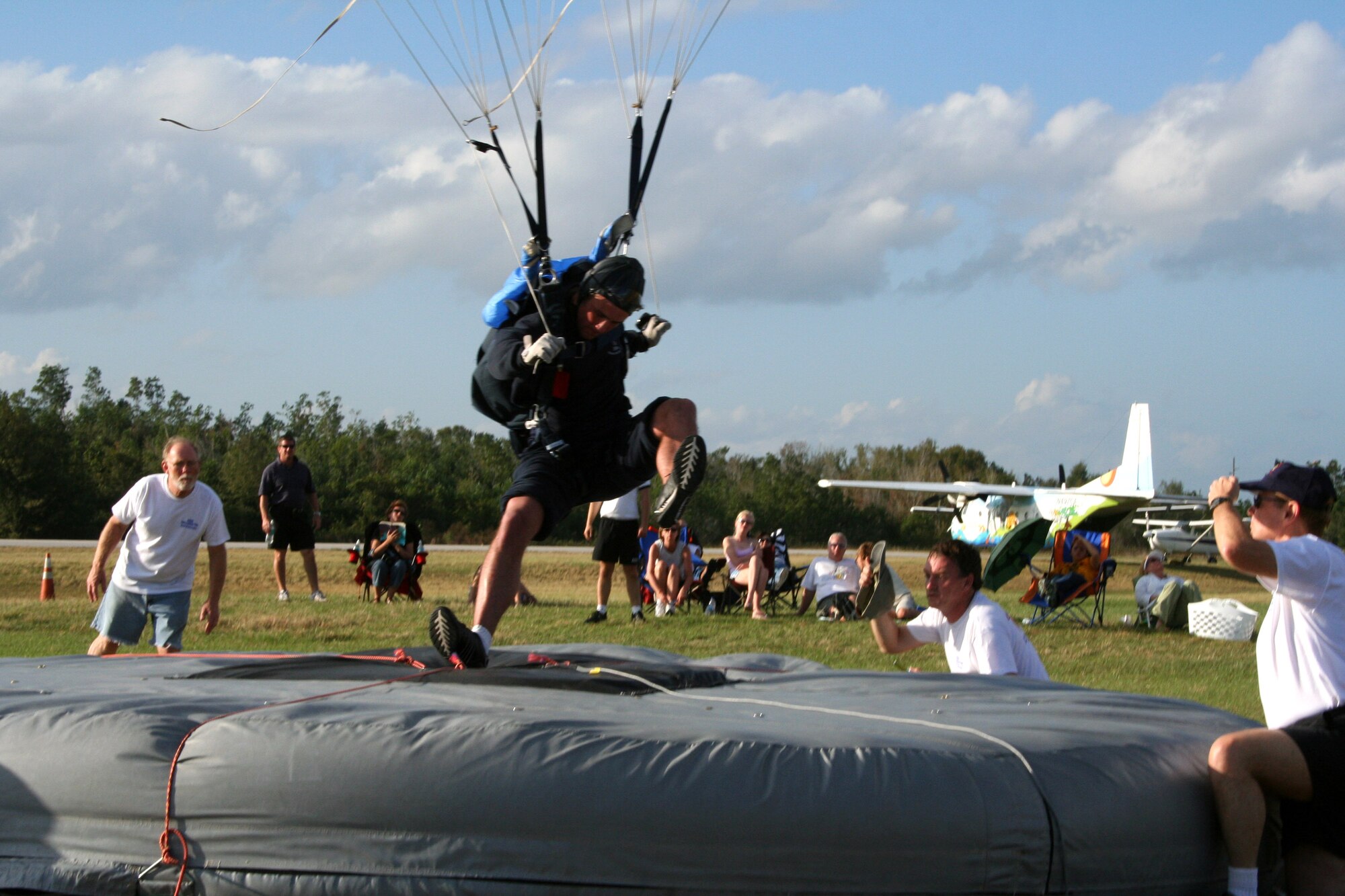U.S. Air Force Academy Cadet 1st Class Mike Bush touches down in the individual accuracy event at the National Collegiate Parachuting Championship held Dec. 27 to Jan. 1 at Lake Wales, Fla. Cadet Bush was crowned the overall 2006 National Champion in the competition. (Courtesy photo)
