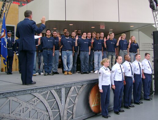 CLEVELAND, Ohio—The 910th Airlift Wing Recruiting staff kicked off their Fiscal Year 2007 recruiting campaign Oct. 21, 2006 with a special mass enlistment ceremony at the Rock-N-Roll Hall of Fame here.  Several young men and women made a proud decision to join the Air Force Reserve and become members of the 910th Airlift Wing, located at Youngstown Air Reserve Station, Ohio.  Retired Air Force Reserve Brigadier General Tim White provided the Oath of Enlistment to the new Airmen.  U.S. Air Force photo/Senior Master Sgt. Alex Brown.