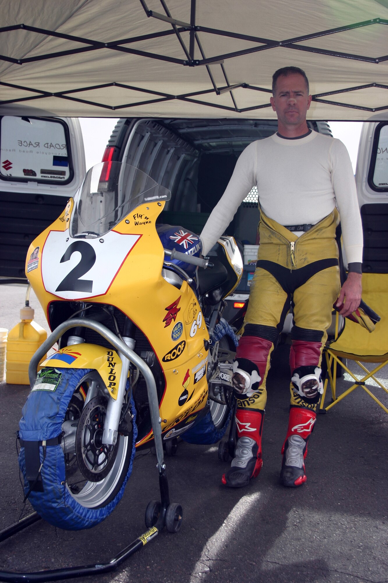 Chief Master Sgt. Wayne Nielsen, 944th Maintenance Squadron munitions systems flight chief, races light-weight bikes whose speeds range from 135 to 140 mph. To prepare himself for competitive racing once a month, the chief works out and eats healthy every day. (Photo by Jack Frost)