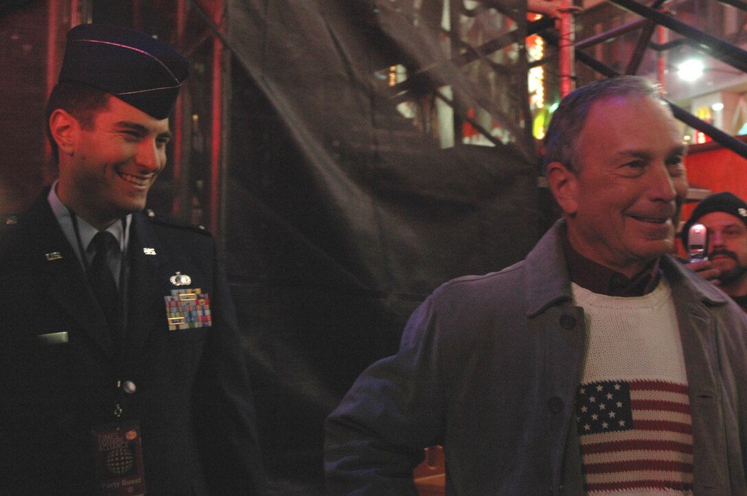 1st Lt. Erick Saks, 305th Air Mobility Wing, McGuire Air Force Base, N.J., rings in the New Year in style in Times Square, New York City.  He was selected as an honoree of New York Mayor Michael R. Bloomberg and joined nine other service members from all branches of the military to help Mayor Bloomberg push the button to drop the ball at midnight. Festivities included numerous media interviews as well as a live interview on the Carson Daly show, NBC. (U.S. Air Force photo/Senior Airman Rachel Bernardes) 