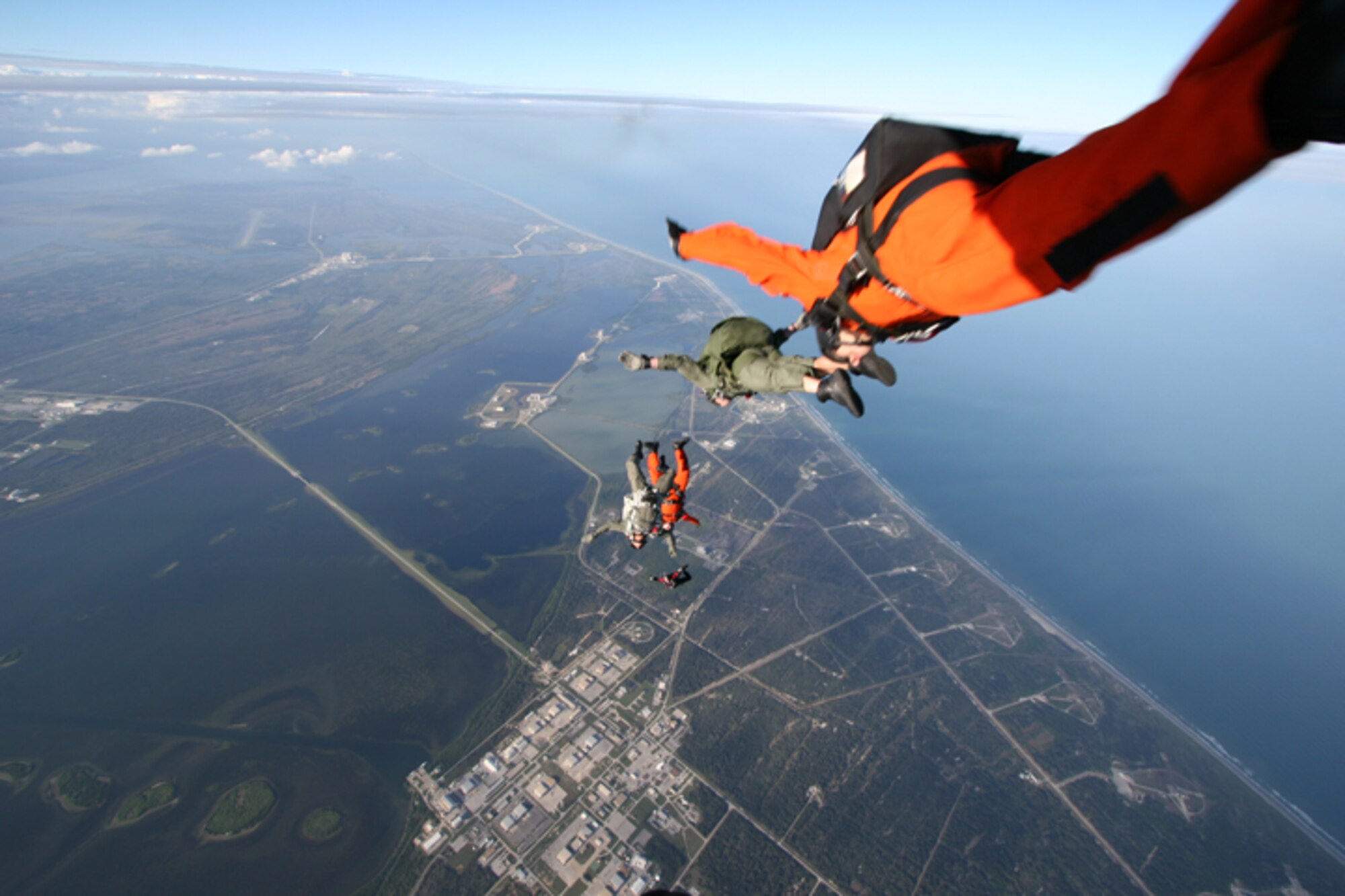 As part of in International Search and Rescue Exercise, Air Force Reserve Pararescumen from the 920th Rescue Wing at Patrick Air Force Base train at Cape Canaveral Air Station with Canadian Rescue Forces from the 435th Air Transport and Rescue Squadron based in Winnipeg, Canada.  "Working with the Canadians has given us the opportunity to exchange invaluable procedures and techniques for rescue training and implementation," said Lt. Col. Dan Byers 39th Rescue Squadron HC-130 P/N Navigator and SAREX coordinator.  (U.S. Air Force photo by TSgt. Robert Grande)