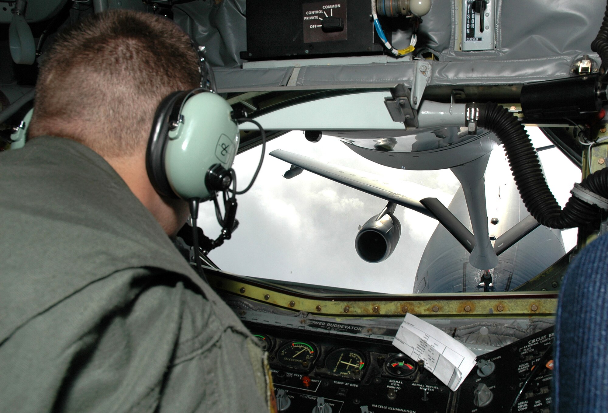Airman 1st Class Lance Welch practices air refueling with a KC-10 Extender from the 60th Air Mobility Wing during a training mission Jan. 3 originating from Travis Air Force Base, Calif. Airman Welch is boom a operator with the Air Force Reserve Command's 940th Air Refueling Wing. (U.S. Air Force photo/Staff Sgt. Luke Johnson)
