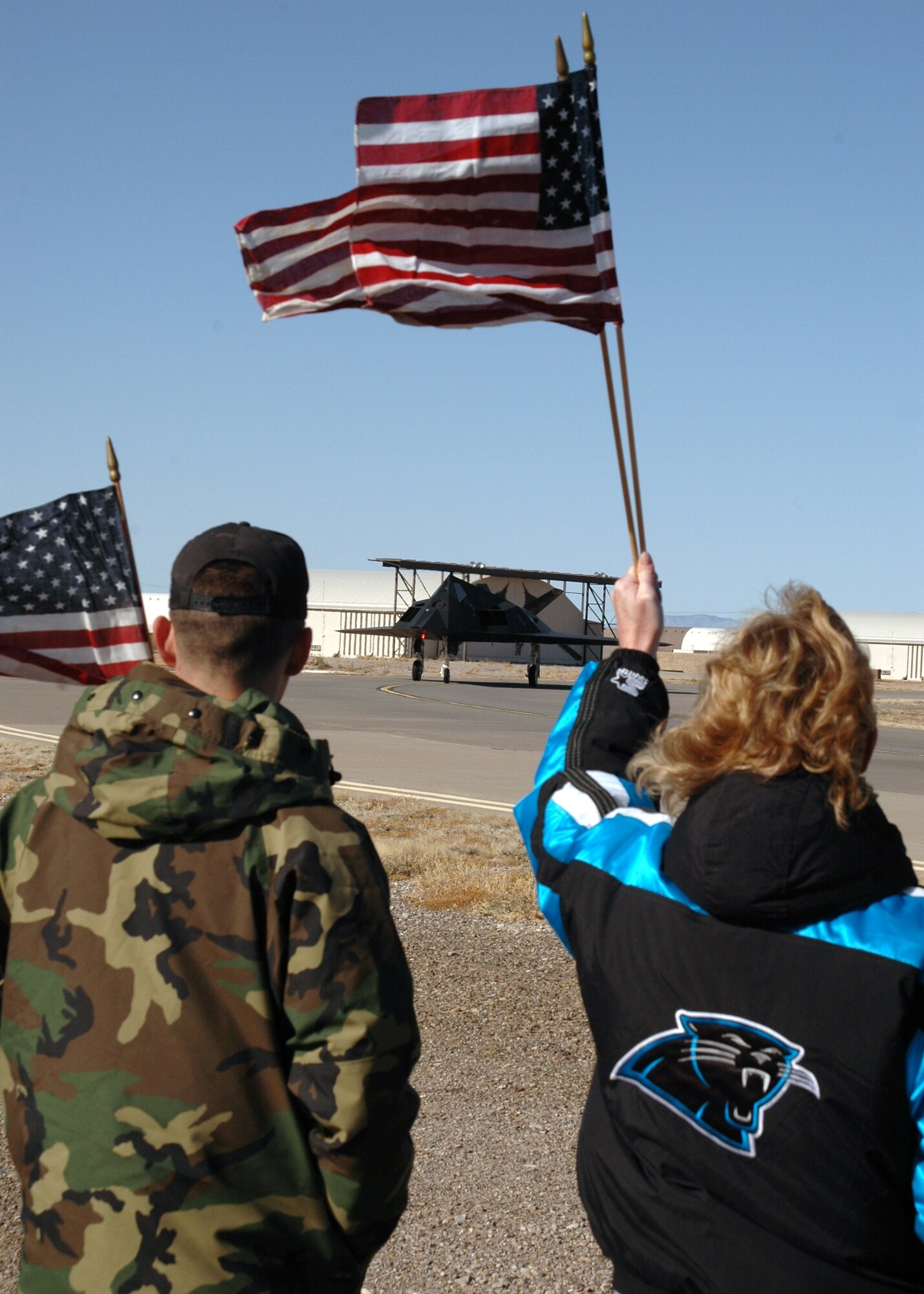 Both Holloman Airmen and Alamogordo community members came to the flightline Jan. 8 to say farewell to the 9th Fighter Squadron F-117A pilots headed to the Republic of Korea for a preplanned deployment. (U.S. Air Force photo by Airman Jamal Sutter)