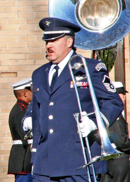 MSgt Dean Smith of the USAF Band of Mid-America performs with the USAF Band of Flight at President Gerald Ford's funeral Jan 3 at the Grace Episcopal Church in Grand Rapids, Mich.