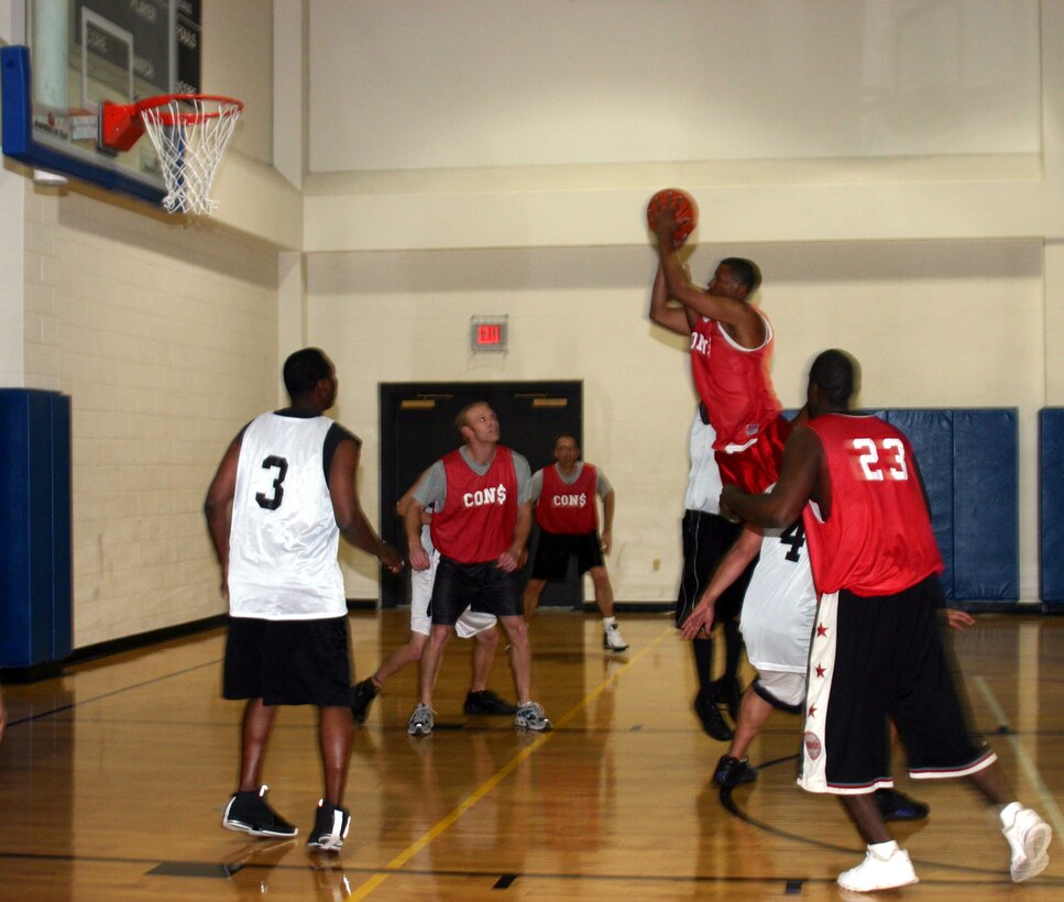 Haven Wynne, 82nd Contracting Squadron, leaps past the oppostion to make a shot in the 82nd CONS game against the 82nd Medical Operations Squadron Jan. 8. The 82nd CONS won 67-30, taking their record to 5-0.