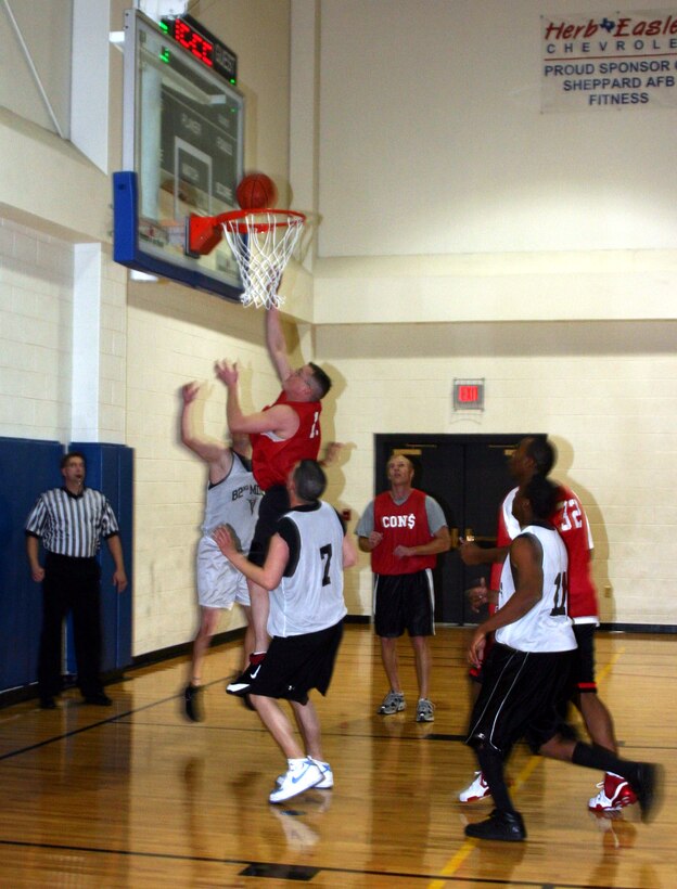 Joshua Miller, 82nd Contracting Squadron, attempts a lay up in the 82nd CONS game against the 82nd Medical Operations Squadron Jan. 8. The 82nd CONS won 67-30, taking their record to 5-0.