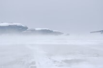 MINOT AIR FORCE BASE, N.D. -- A group of B-52H Stratofortresses sit on the flight line during low visibility weather here Jan. 8. The base also experienced freezing temperatures and gusts of wind up to 50 knots. (U.S. Air Force photo by Airman 1st Class Christopher Boitz) 