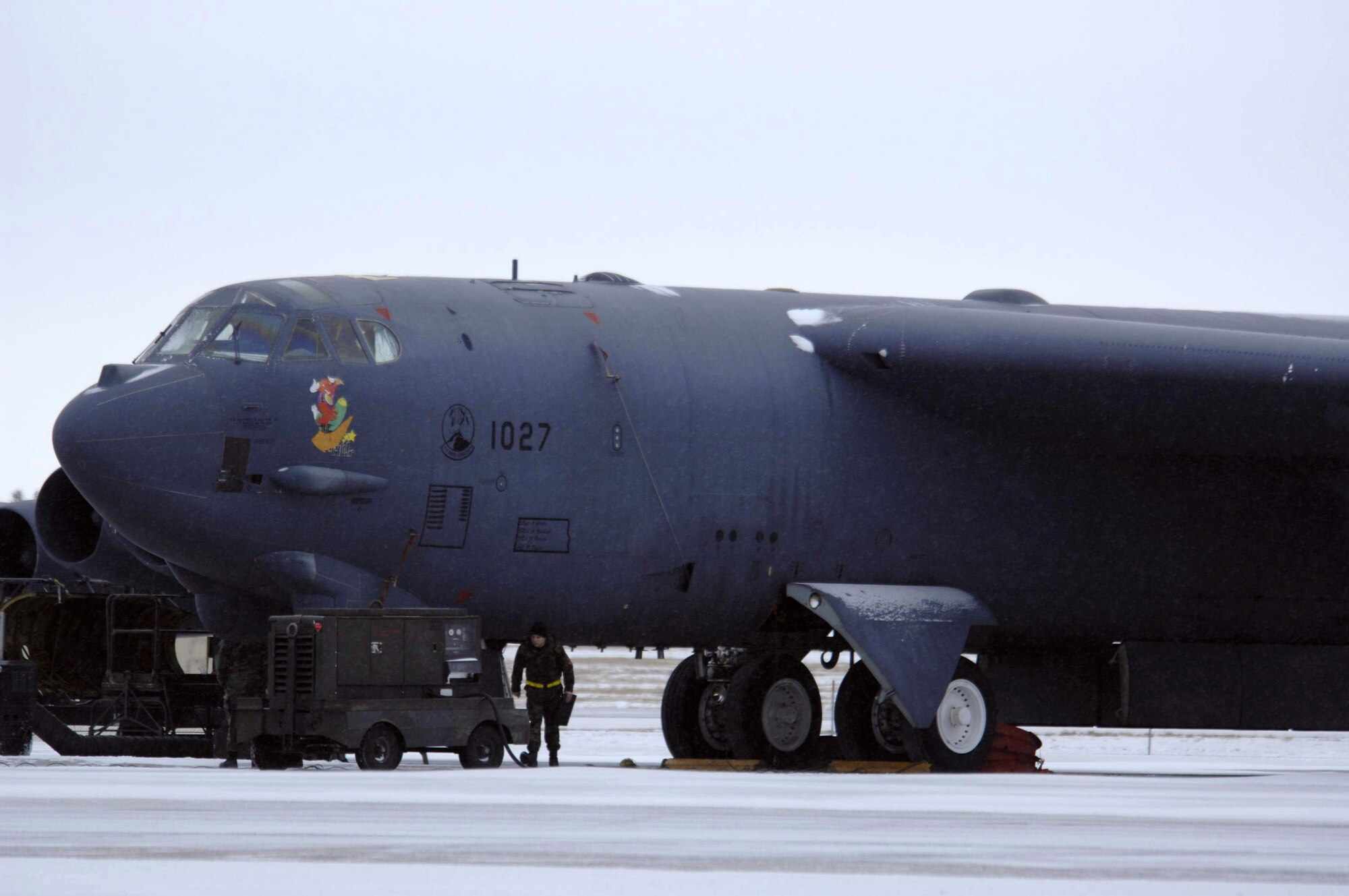Airmen prepare a B-52H Stratofortress for flight Jan. 8 at Minot Air Force Base, N.D. They endured sub-zero temperatures and gusts of wind up to 50 mph. The Airmen are with the 5th Aircraft Maintenance Squadron. (U.S. Air Force photo/Airman 1st Class Christopher Boitz)
