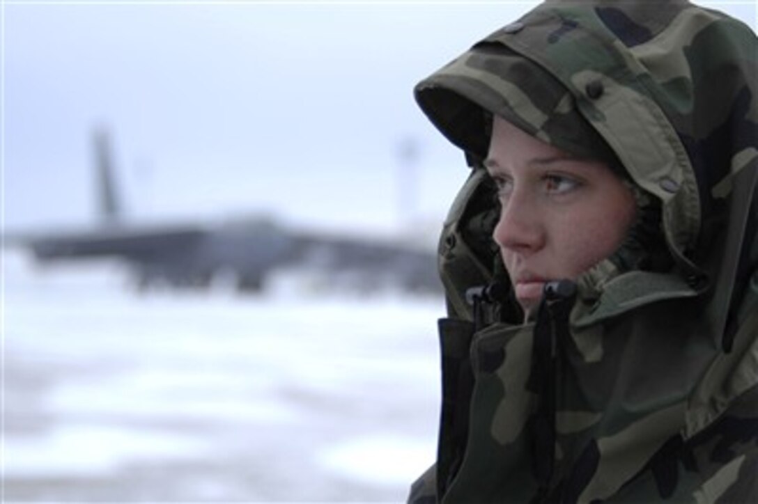 Airman Shaina Smith waits for a B-52 Stratofortress aircrew Jan. 8 at Minot Air Force Base, N.D.  Smith and the rest of her maintenance team worked through harsh sub-zero temperatures and gusts of wind up to 50 mph.