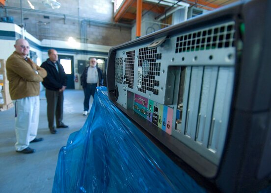 A stack of computers wait for delivery to the Muroc Joint Unified School District on Dec. 15, 2006, as part of the Defense Reutilization and Marketing Service's Department of Defense Computers for Learning program. (Photo by Mike Cassidy)