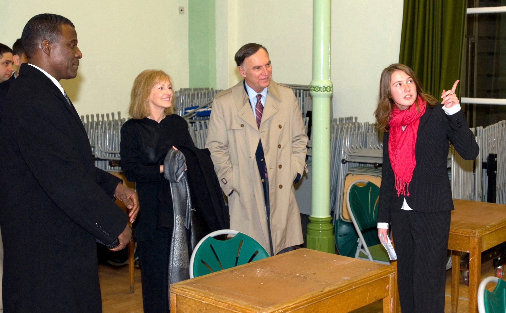 Katie Ruddey (right), a student at Recombe College, gives a tour of the school Jan. 10 to Gen. William T. Hobbins, U.S. Air Forces in Europe command (center), his wife Robbin Hobbins, and Chief Master Sgt. Gary Coleman, USAFE command chief master sergeant. (U.S. Air Force photo/Senior Master Sgt. Jon Nicolussi)
