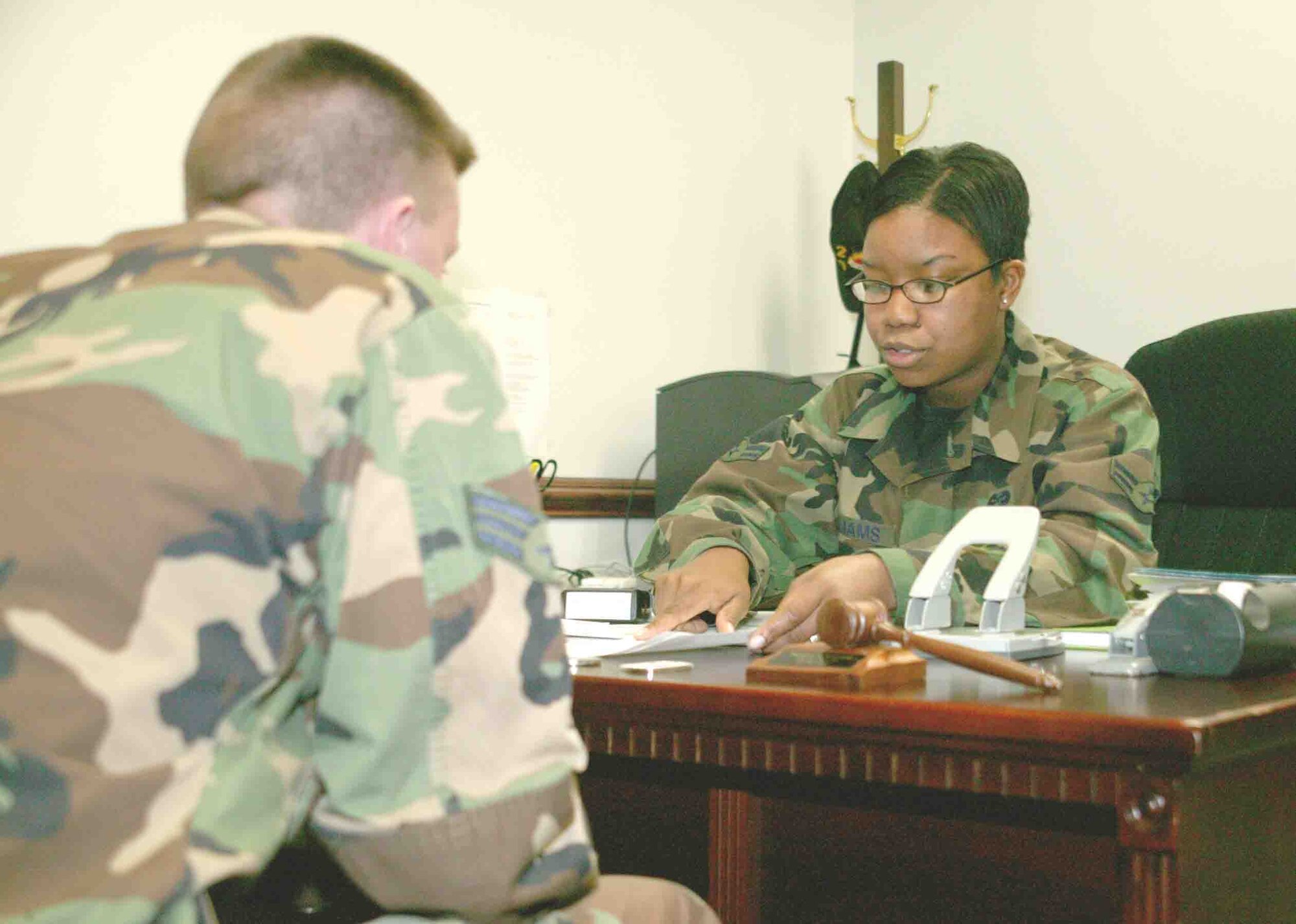 SHAW AIR FORCE BASE, S.C. -- Airman 1st Class Nerissa Williams, 20th Fighter Wing Judge Advocate civil law paralegal, gives legal assistance to a client. (U.S. Air Force photo/Senior Airman John Gordinier)