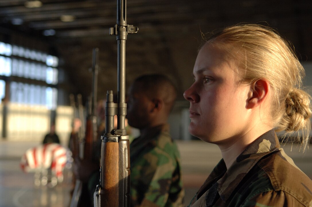 Senior Airman Morgan Dunkle, 28th Maintenance Squadron, participates in honor guard practice with the other members of the 28th Bomb Wing Honor Guard. The Honor Guard is practicing to participate in an active-duty funeral service. (U.S. Air Force Photo/A1C Angela Ruiz)