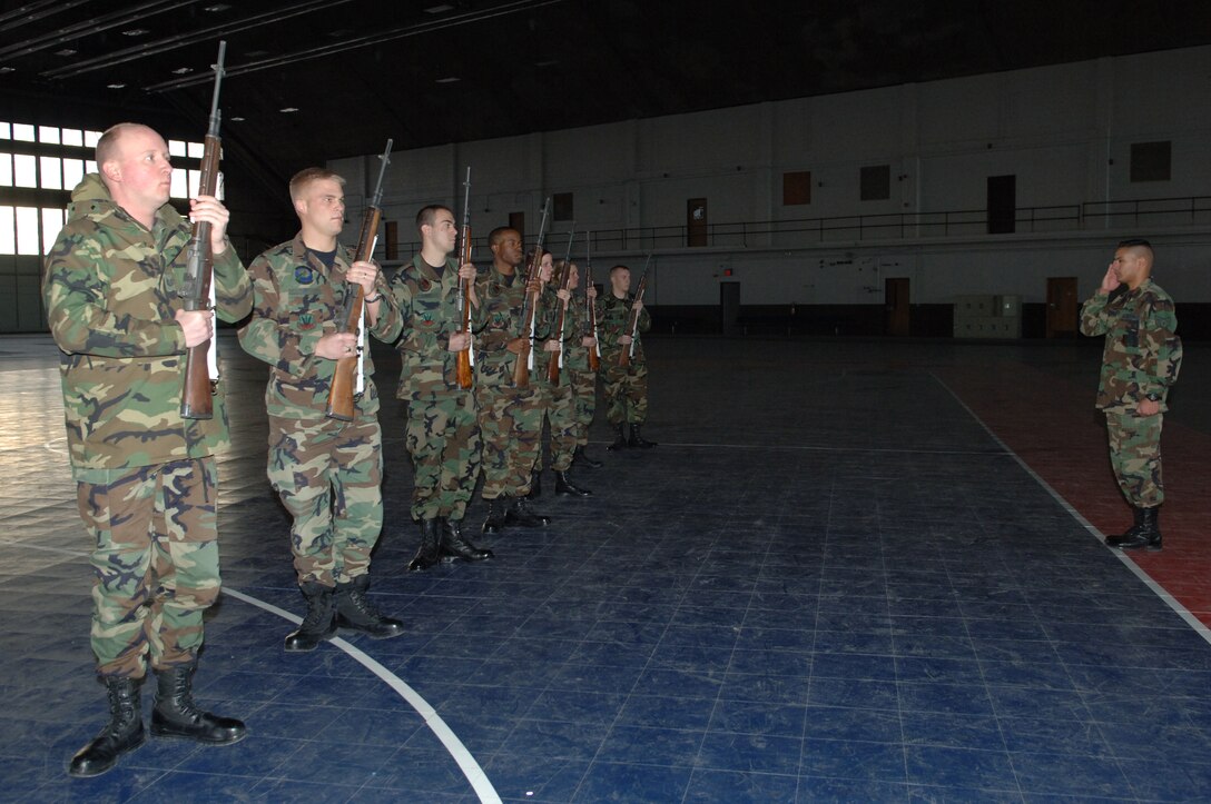 Members of the 28th Bomb Wing Honor Guard conduct practice Jan. 4. The Honor Guard is practicing to perform at an active-duty funeral service. (U.S. Air Force Photo/A1C Angela Ruiz)
