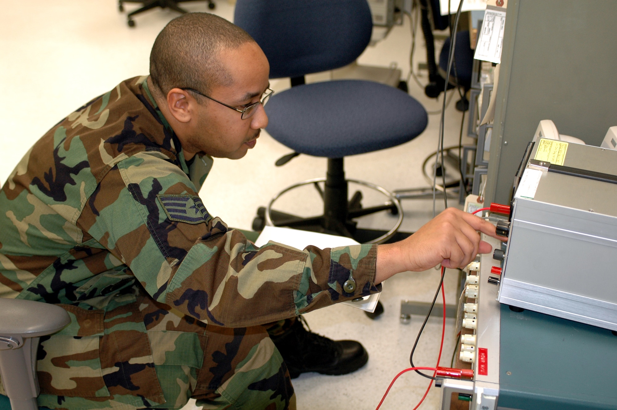 Staff Sgt. Louis Wales, Precision Measurement Equipment Laboratory craftsman, transfers the accuracy of standard to a piece of avionics equipment from the 144th Fighter Wing in Fresno, Calif. Travis’ PMEL provide equipment repair and calibration for many on base organizations as well as off-base organizations such as the 144th Fighter Wing in Fresno, Calif., and the 173rd Fighter Wing at Kingsley Field, Ore. (U.S. Air Force photo by 1st Lt. Lindsey Hahn)