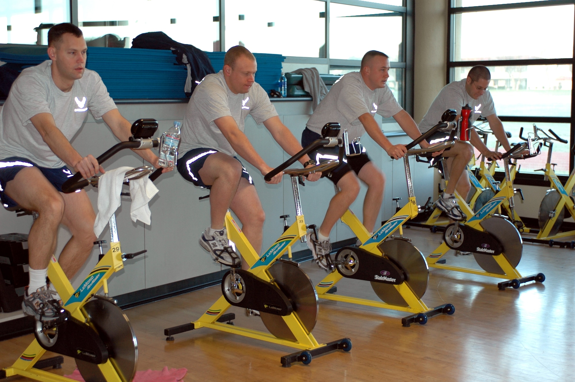 S.M.A.R.T. Goals program participants take part in a cycling class. Program participants may attend any of the nine different types of classes offered during the month and have the class instructor sign their S.M.A.R.T. card to give them credit. (U.S. Air Force photo by Staff Sgt. Candy Knight)