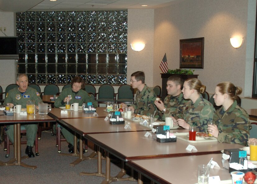 Maj. Gen. James Hawkins, 18th Air Force commander, and Chief Master Sgt. Brye McMillon, 18th Air Force command chief, speak to Grand Forks Air Force Base Airmen during breakfast at the Airey Dining Facility Jan. 10. (photo/Airman 1st Class SerMae Lampkin)