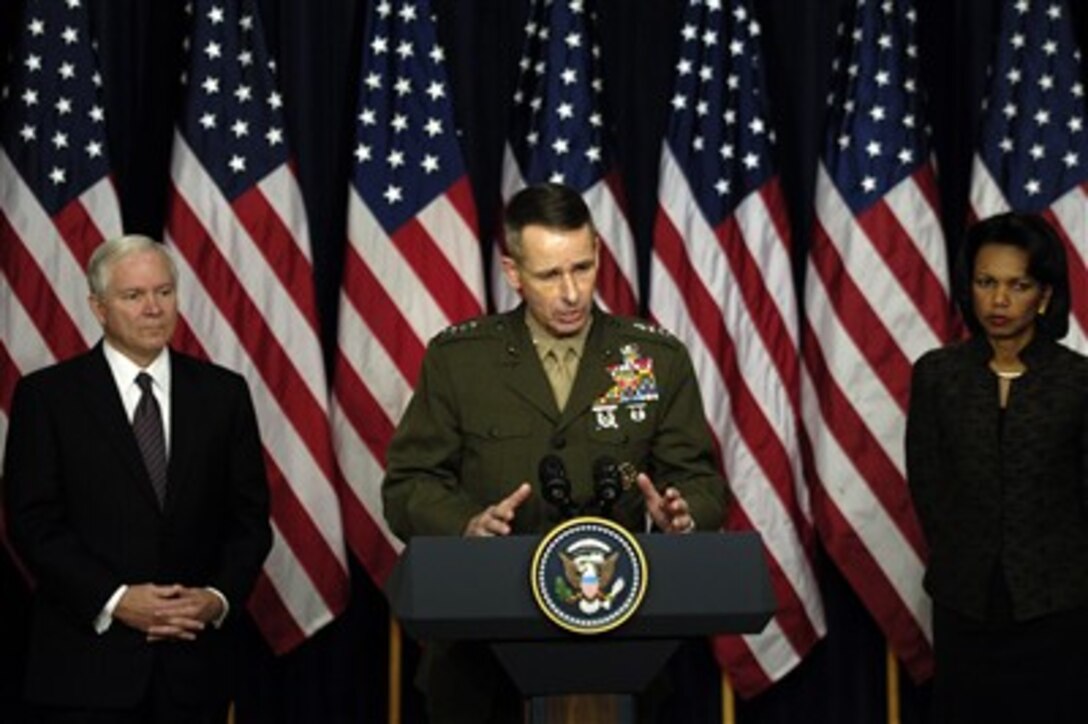 Chairman of the Joint Chiefs of Staff Gen. Peter Pace, accompanied by Defense Secretary Robert Gates and Secretary of State Condoleezza Rice, address questions at a news conference in Washington, Jan. 11, 2007.  