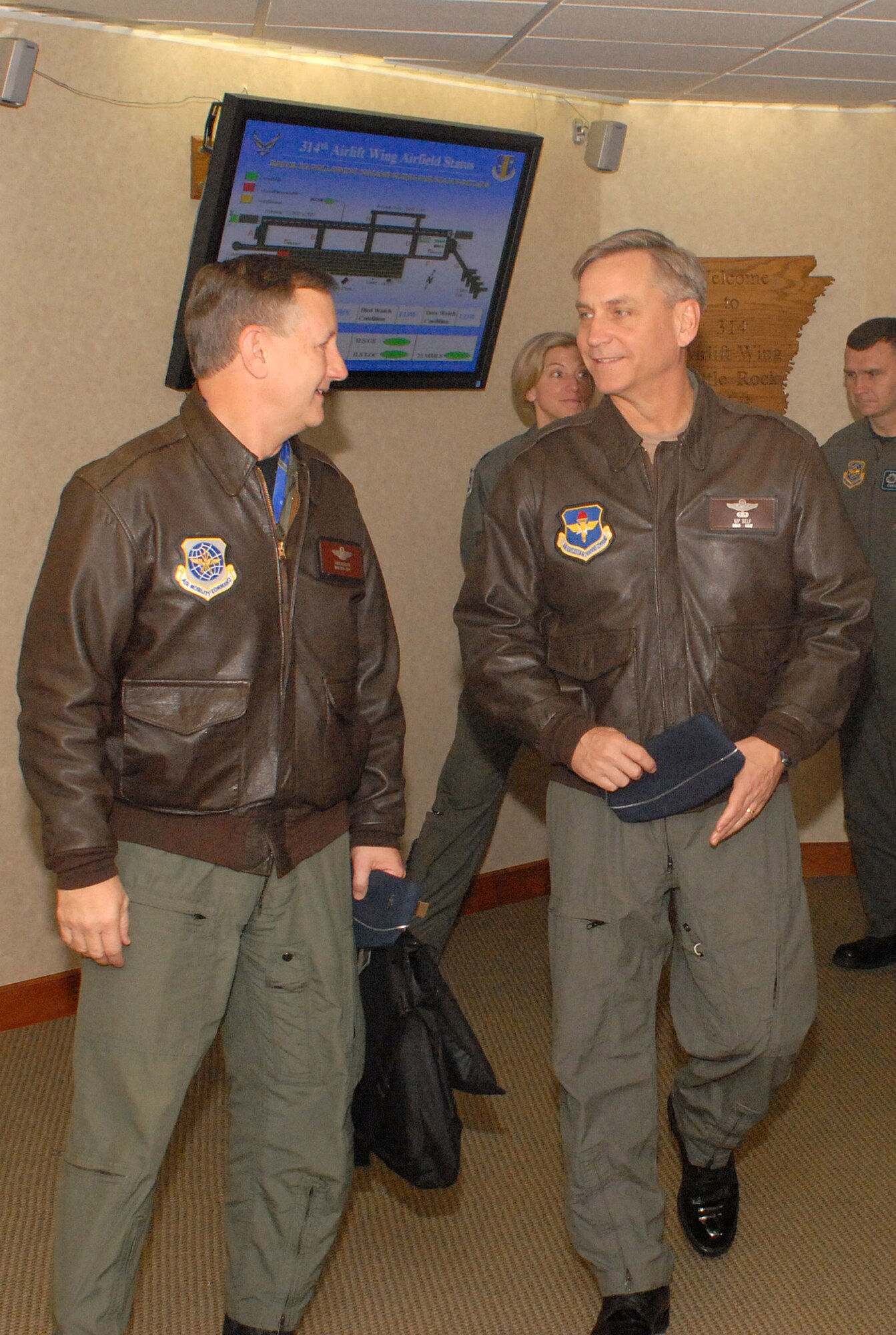 Brig. Gen. Frederick Roggero, (left) Air Mobility Command deputy director of Air, Space and Information Operations, talks with Brig. Gen. Kip Self, 314th Airlift Wing commander, after briefing aircrews Jan. 11 on the importance of remaining vigilant while flying missions. Recently, AMC crews have seen an increase in the occurrence of Class A mishaps with Department of Defense aircraft -- five in the last 16 months. (Photo by Airman 1st Class Nathan Allen)