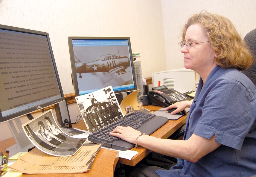 Dr. Haithe Anderson, 23rd Wing historian, researches historical documents at her office Wednesday. Moody is currently preparing base civilian employees for the implementation of the National Security Personnel System Jan. 21. The system will update civilian payment and career advancement practices. (U.S. Air Force photo by Tech. Sgt. Parker Gyokeres)
