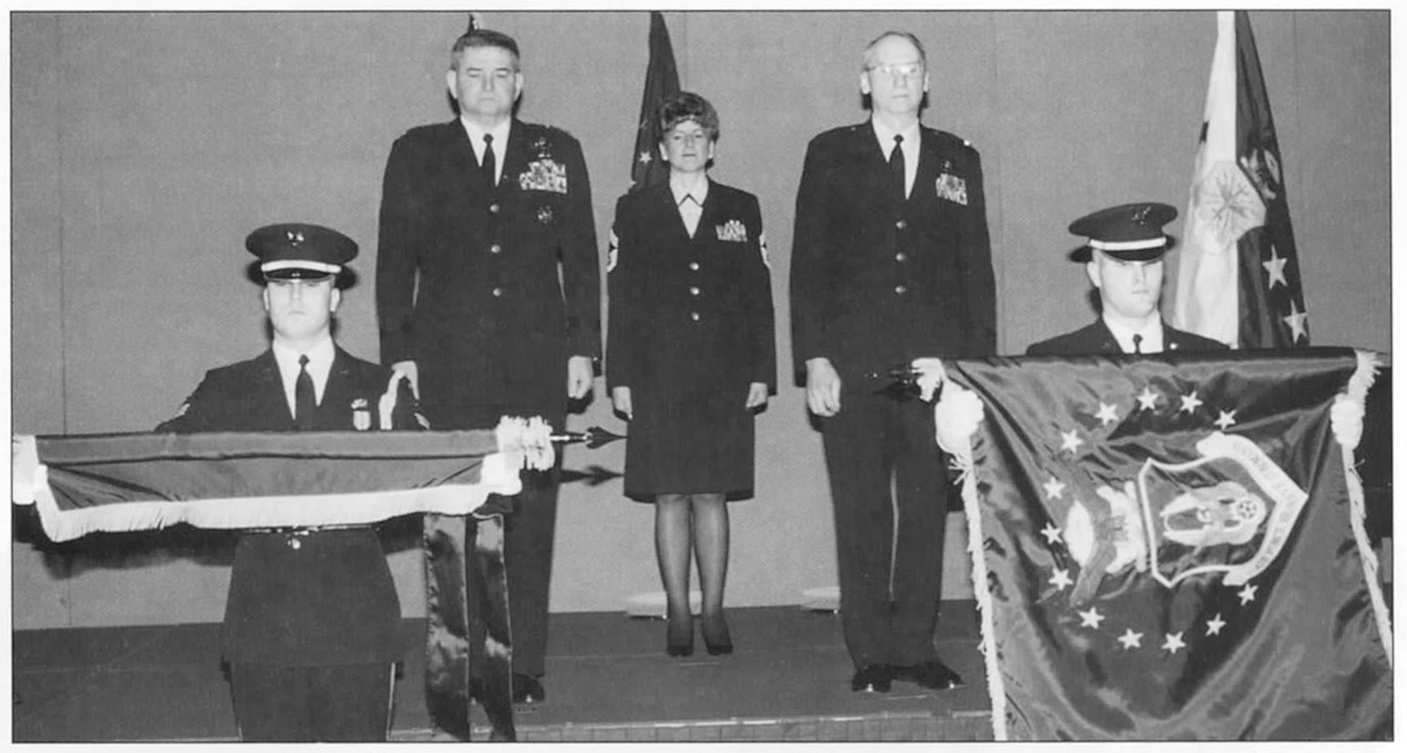 (Left to right) Gen. Ronald R. Fogelman, Air Force chief of staff; Chief Master Sgt. Carol Smits, Air Force Reserve Command senior enlisted advisor; and Maj. Gen. Robert A. McIntosh, AFRC commander, look on as the new Air Force Reserve Command flag is presented. The ceremony, establishing AFRC as the Air Force's ninth major command, took place Feb. 17, 1997, during the Reserve Officers Association Mid-Winter Conference and Military Exposition at the Washington Hilton Hotel. Prior to becoming a MAJCOM, the Reserve functioned as a field operating agency.