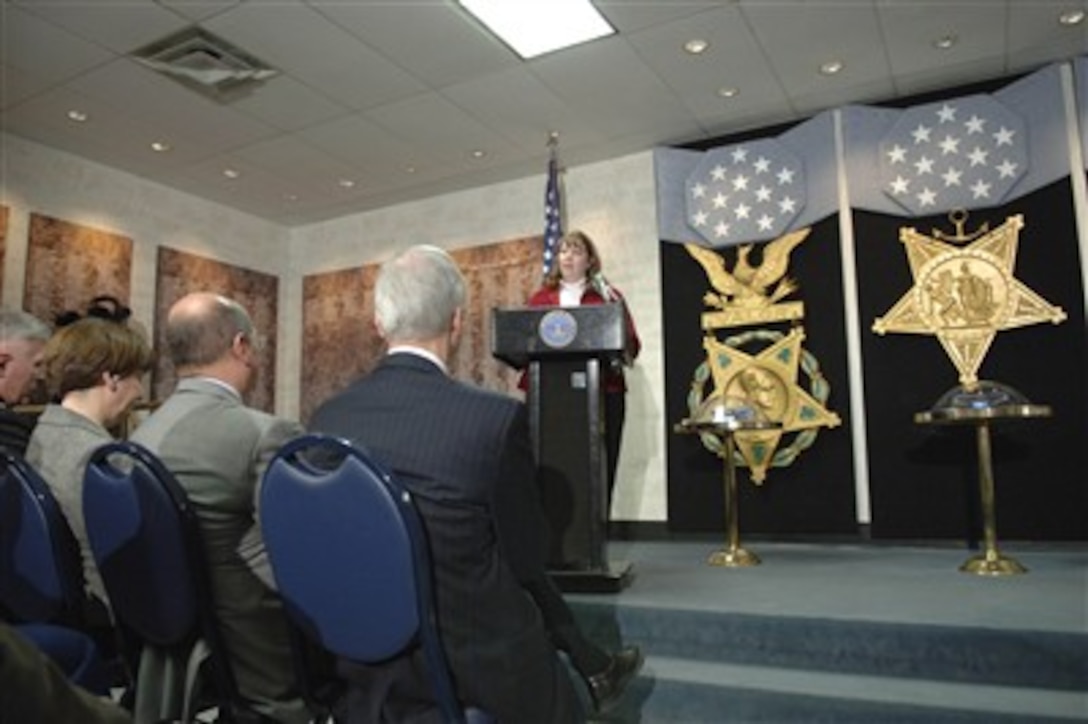 Deb Dunham speaks to those gathered at the Pentagon Hall of Heroes during the induction ceremony of her son U.S. Marine Cpl. Jason Dunham on Jan. 12, 2007.  Dunham received the Medal of Honor posthumously for his heroic actions in Iraq.  