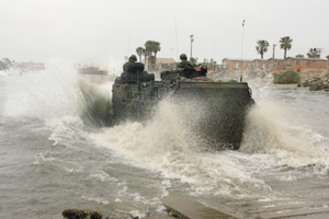 Students with the Assault Amphibious School Battalion ?splash down? into the ocean at Del Mar Beach as they conduct Assault Amphibious Vehicle training April 4. The Marines are learning how to maneuver the 26-ton vehicles, which can travel at speeds of more than 45 mph.