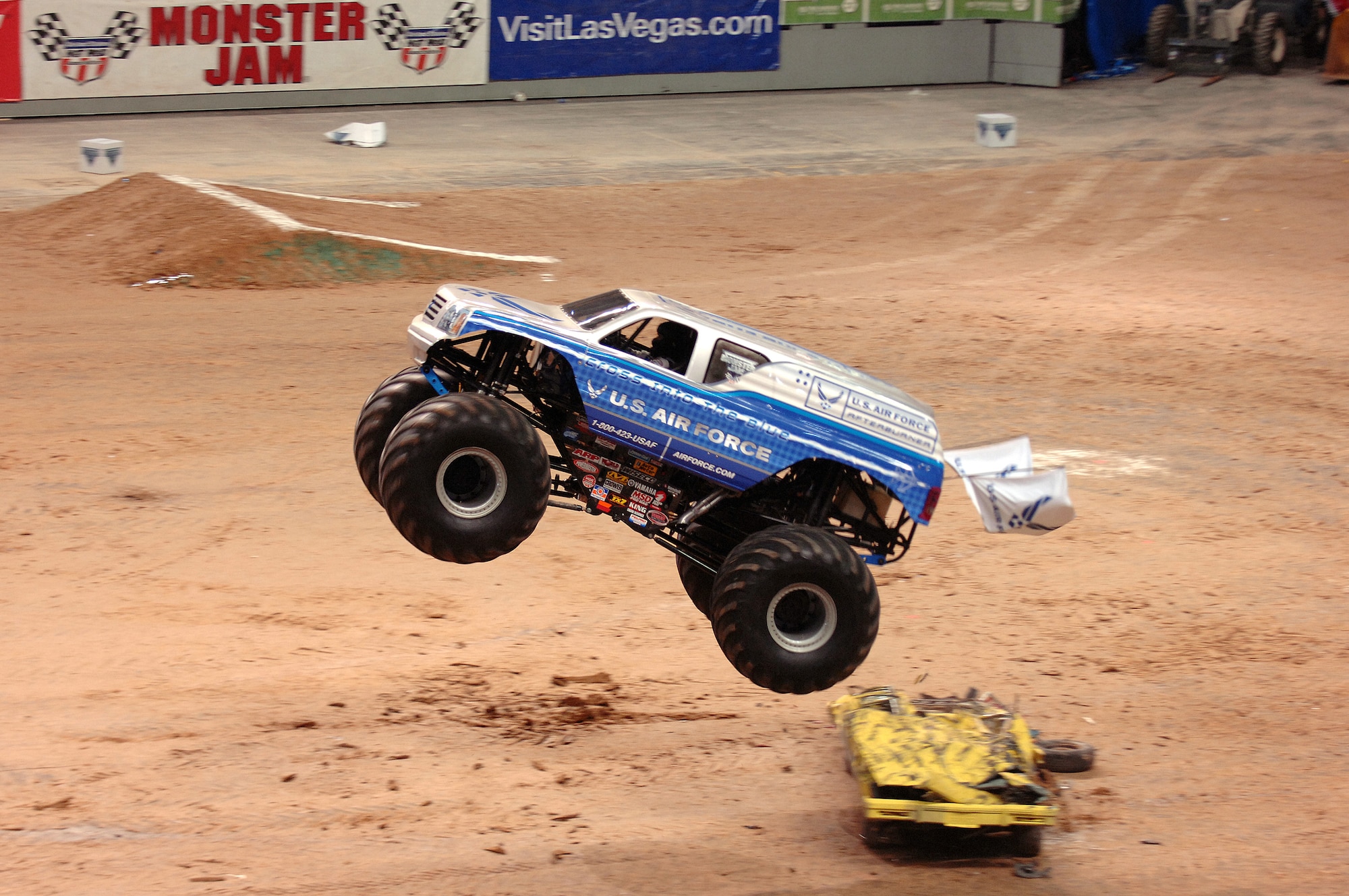 The Air Force sponsored monster truck Afterburner, driven by Damon Bradshaw, goes airborne over an obstacle during the free style round of the 2007 Monster Jam in San Antonio, Texas. (US Air Force photo/Master Sgt. Scott Reed)