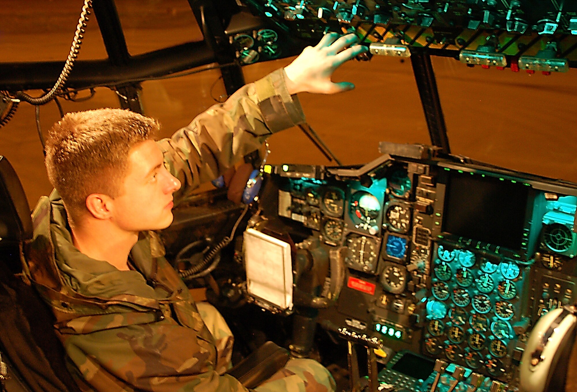 Senior Airman Dwight Madero, propulsion specialist with the 723rd AMXS, shuts down an HC-130P engine during a maintenance run Jan. 9. (U.S. Air Force photo by Tech. Sgt. Parker Gyokeres)