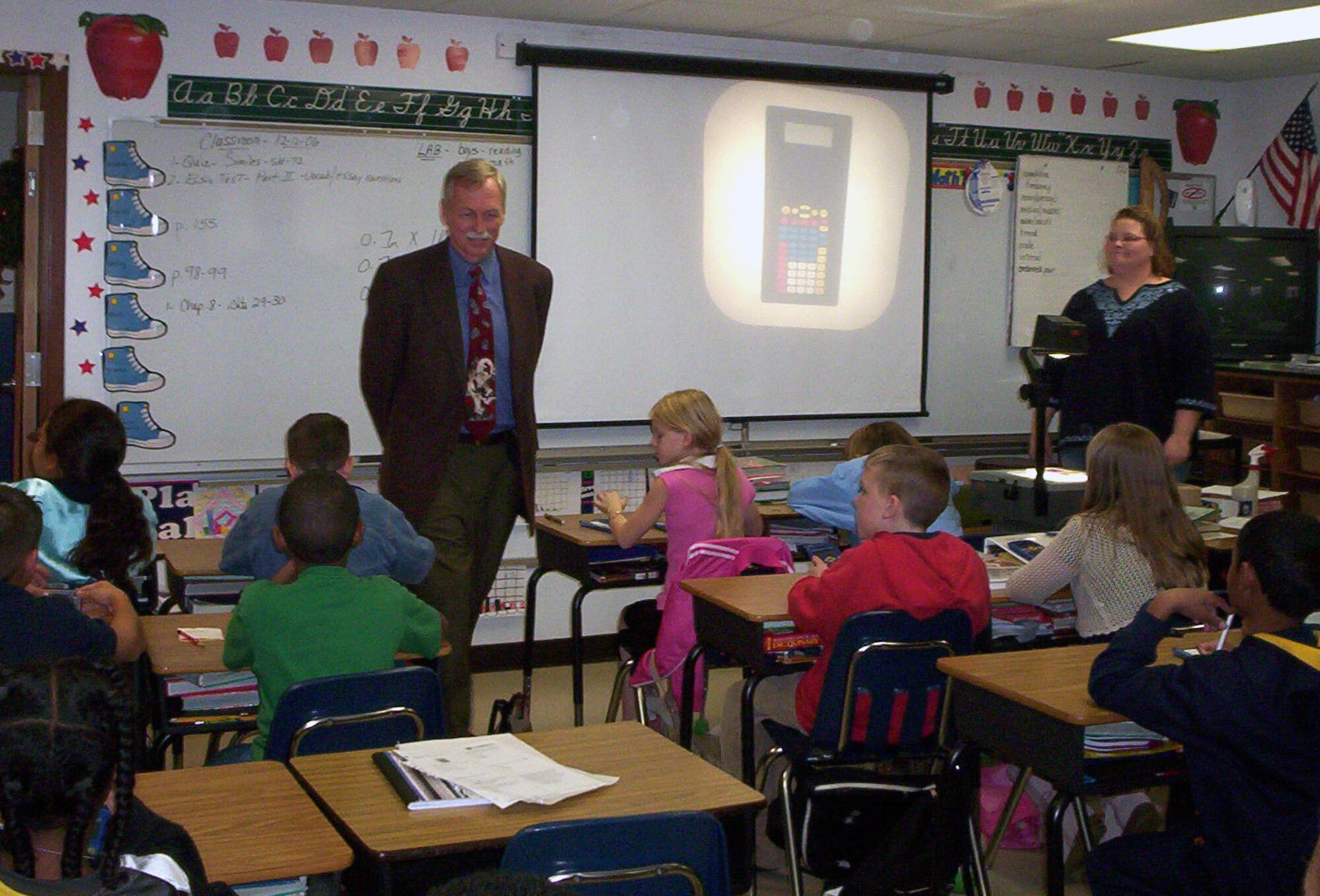 Congressman Vic Snyder visits with Cheri Dunlap's fifth grade students at Arnold Elementary School recently to see the base's school facilities first-hand. Arnold Elementary School, while boasting among the highest test scores in the state, is in need of some repairs. (Courtesy photo)