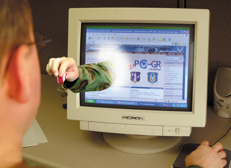 One of the services currently available on the Air Reserve Personnel Center's Virtual Personnel Center Guard and Reserve portal is the electronic processing of requests for awards and decorations.  (Photo Illustration/Maj. David Kurle)