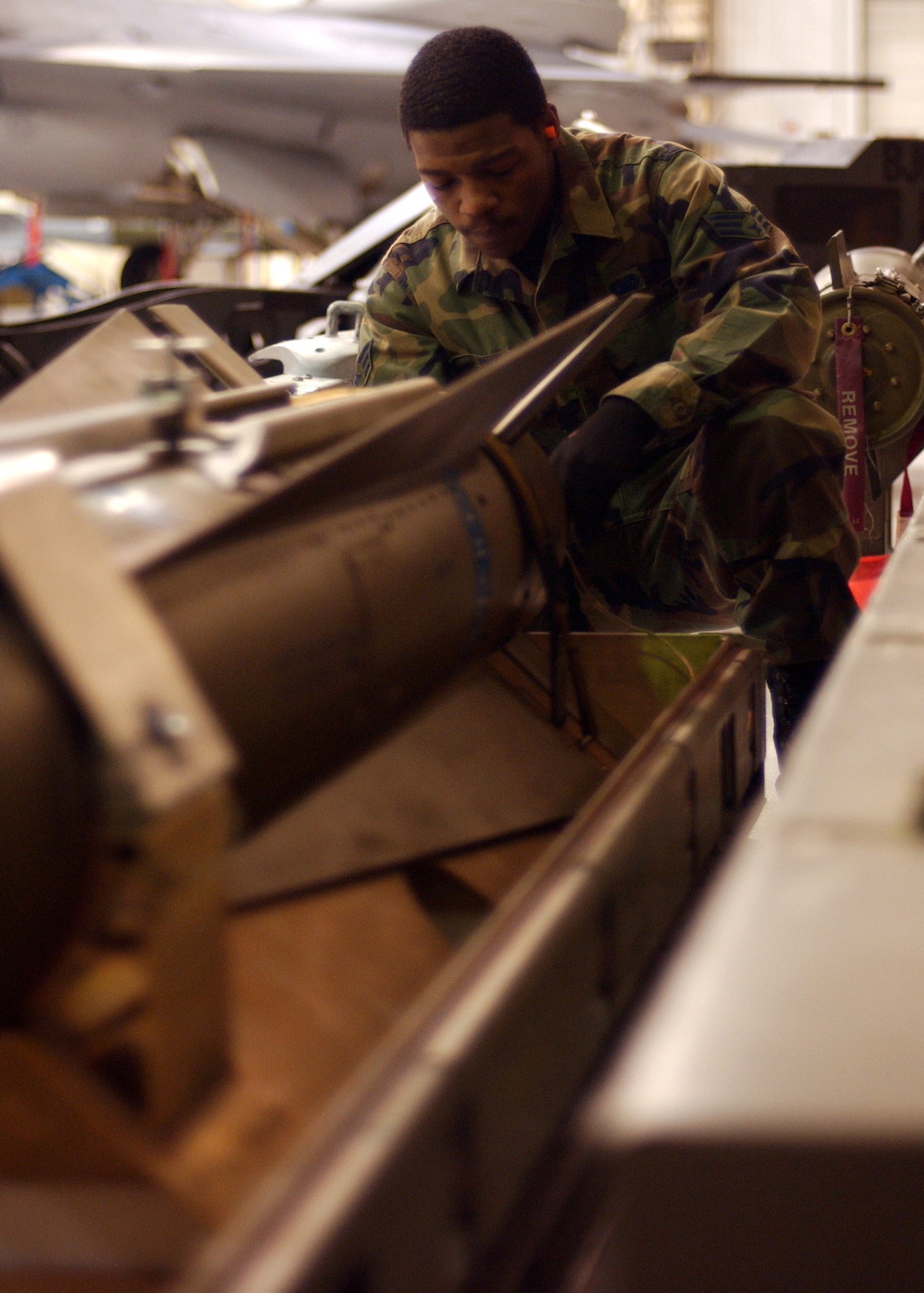 EIELSON AIR FORCE BASE, Alaska -- Senior Airman Keitric King, 355th Aircraft Maintenance Unit, 354th Aircraft Maintenance Squadron prepares the Air to Ground Missile 65 D Bomb to be loaded onto an A-10 thunderbolt II for the Weapons Standardization Load Crew of the Year Competition here on Jan. 11. The Competition evaluates technical proficiency, safety procedures and overall time. The 355th AMU's overall time was 50 minutes and 17 seconds. 
(US Air Force Photo by Airman Jonathan Snyder)
