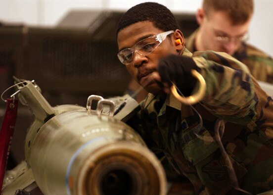 EIELSON AIR FORCE BASE, Alaska -- Senior Airman Keitric King, 355th Aircraft Maintenance Unit, 354th Aircraft Maintenance Squadron installs the Fuse Intiator which arms the Guided Bomb Unit 12D/B Bomb that will be loaded onto an A-10 thunderbolt II  for the Weapons Standardization Load Crew of the Year Competition at the Load barn on Jan. 11. The Competition evaluates technical proficiency, safety procedures and overall time. The 355th AMU's overall time was 50 minutes and 17 seconds.  
(US Air Force Photo by Airman Jonathan Snyder)