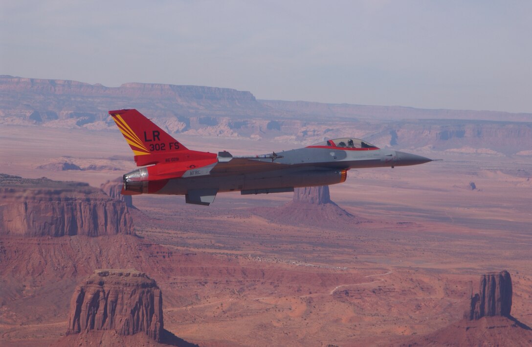 Maj. Robert Churchill, 302nd Fighter Squadron, flies an F-16 Viper painted to commemorate the Tuskegee Airmen of World War II. (U.S. Air Force photo/Tech. Sgt. Lee Harshman)