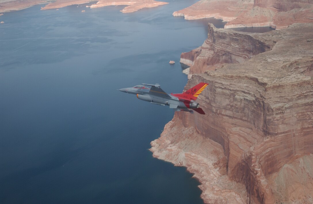 Maj. Robert Churchill, 302nd Fighter Squadron, flies an F-16 Viper painted to commemorate the Tuskegee Airmen of World War II. (U.S. Air Force photo/Tech. Sgt. Lee Harshman)