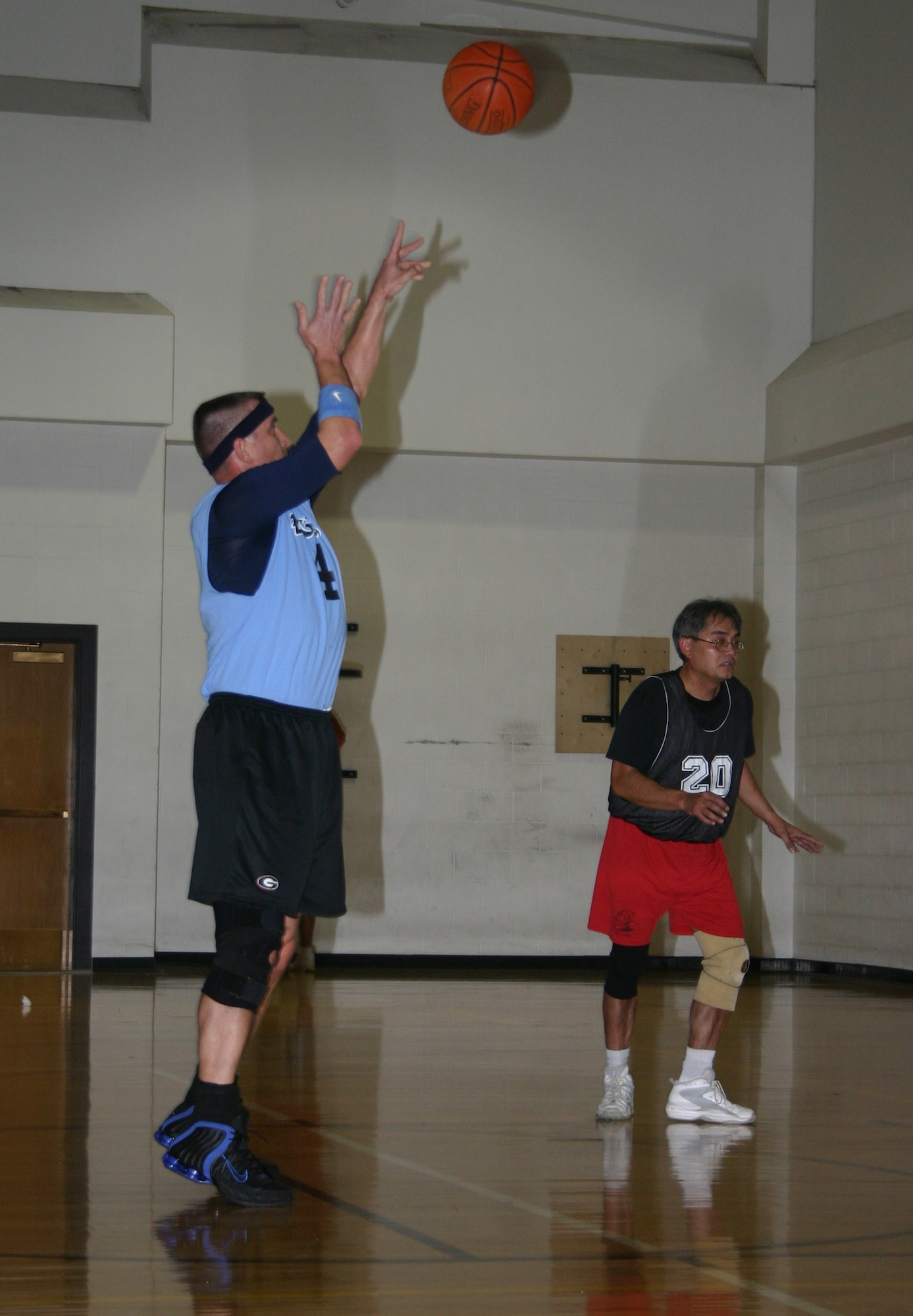 Steven "Alf" McKay, 82nd Mission Support Group commander, makes a jumpshot during the Chiefs vs. Eagles game Jan. 12 at the Pitsenbarger Fitness Center. (U.S. Air Force photo/Airman 1st Class Jacob Corbin.)
