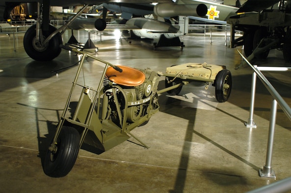 DAYTON, Ohio -- Cushman Airborne Scooter on display in the World War II Gallery at the National Museum of the United States Air Force. (U.S. Air Force photo)