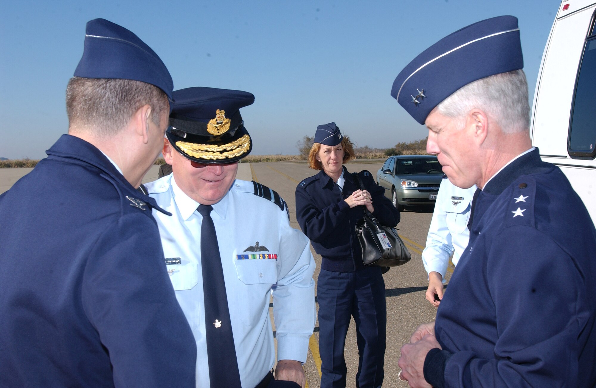 Maj. Gen. William Shelton,14th Air Force commander and Col. Jack Weinstein, 30th Space Wing commander, bid farewell to Air Marshall Geoffrey Shepherd, Chief of Air Force, Royal Australian Air Force at Vandenberg AFB, Calif. on Jan 15.  Air Marshall Shepherd visited Vandenberg as well as several other Air Force bases to get an orientation of how the Air Force operates.  (United States Air Force Photo by Airman Adam Guy)
