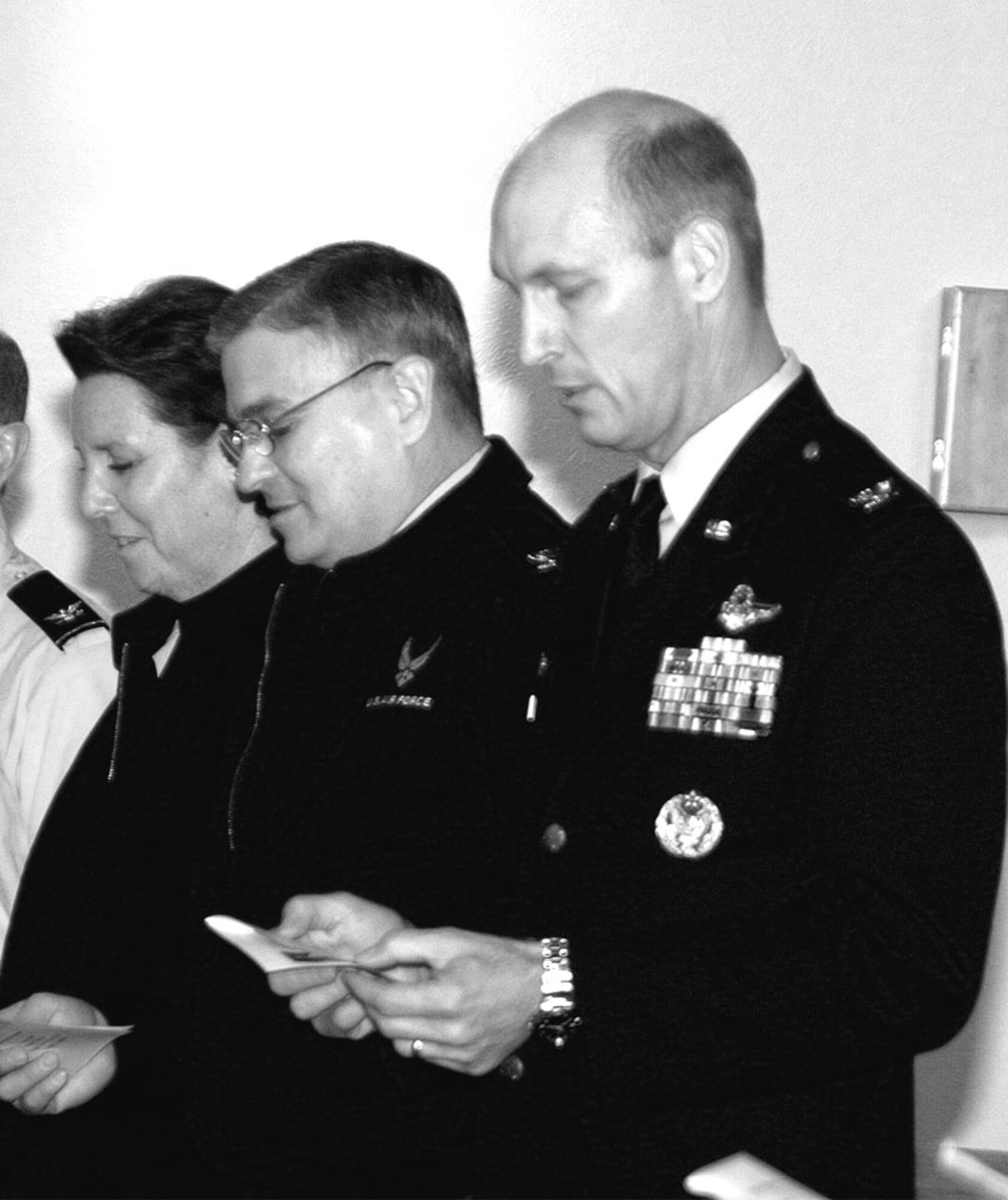 Col. Timothy Zadalis, 43rd Airlift Wing Commander, sings with Team Pope at the Dr. Martin Luther King Jr. observance ceremony Jan. 12. Retired Chief Master Sgt. John Snead was the guest speaker.