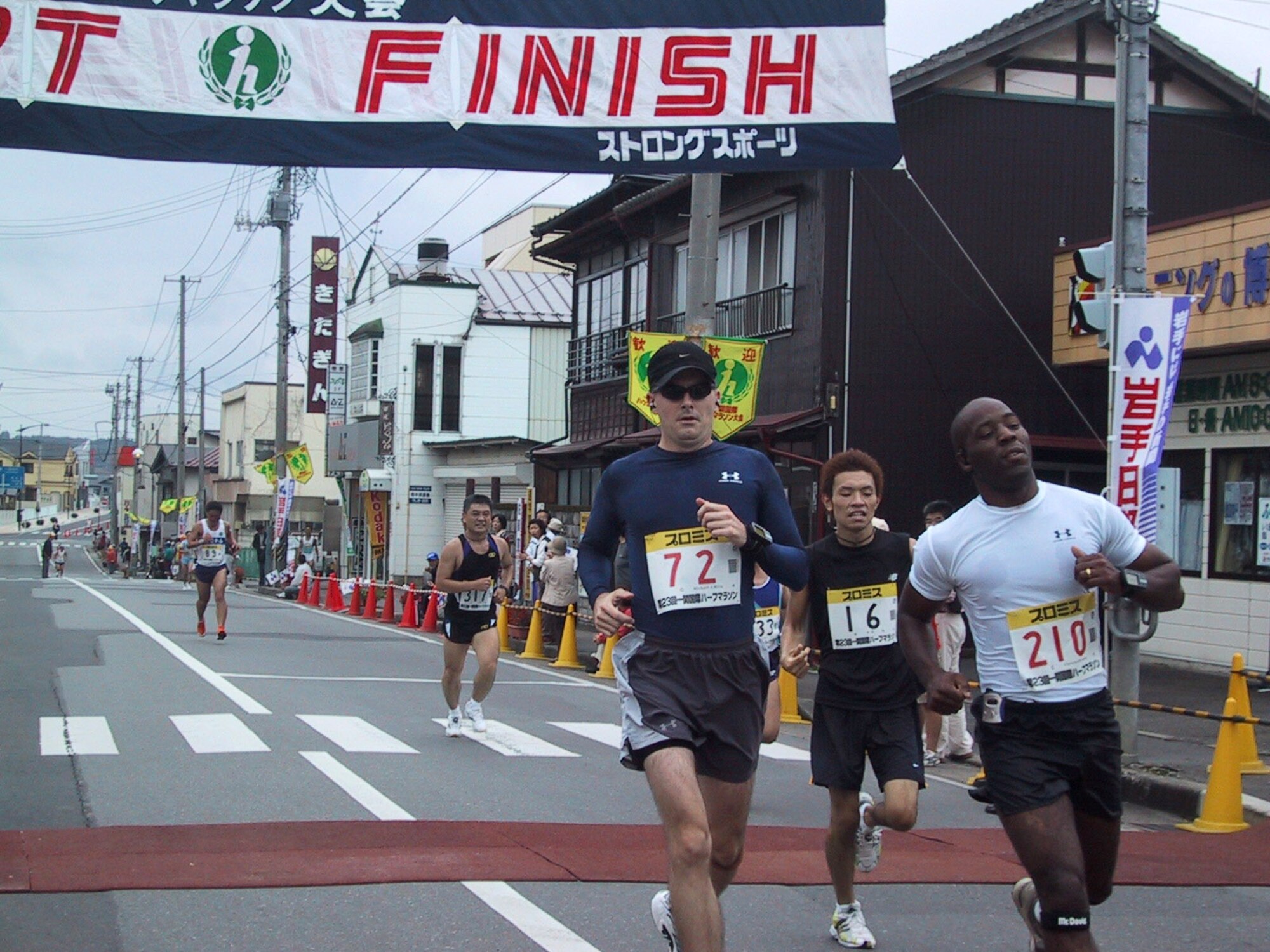 Maj. Michael Mills (72) runs in the Ichinoseki Half Marathon in September 2004 with Lt. Col. Clarence Lukes (210) in Ichinoseki, Japan. Major Mills is assigned to the Headquarters Air Force Weather Plans and Requirement Division and is training for the Antarctica Marathon. (Courtesy photo)