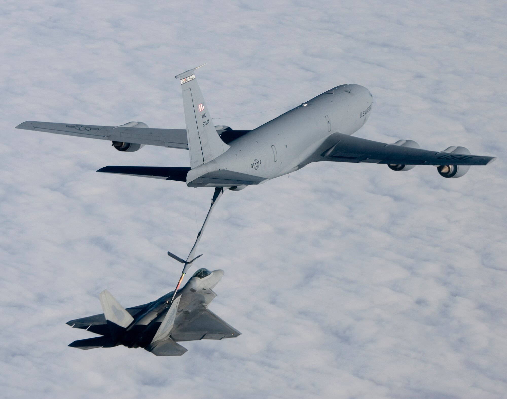 A Grand Forks AFB KC-135 refuels a F-22 Raptor from Edwards AFB. A refueling team from Grand Forks will be the lead tanker unit at the upcoming Red Flag exercise at Nellis Air Force Base, Nev., in February. (photo/Darin Russell)