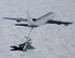 A Grand Forks AFB KC-135 refuels a F-22 Raptor from Edwards AFB. A refueling team from Grand Forks will be the lead tanker unit at the upcoming Red Flag exercise at Nellis Air Force Base, Nev., in February. (photo/Darin Russell)