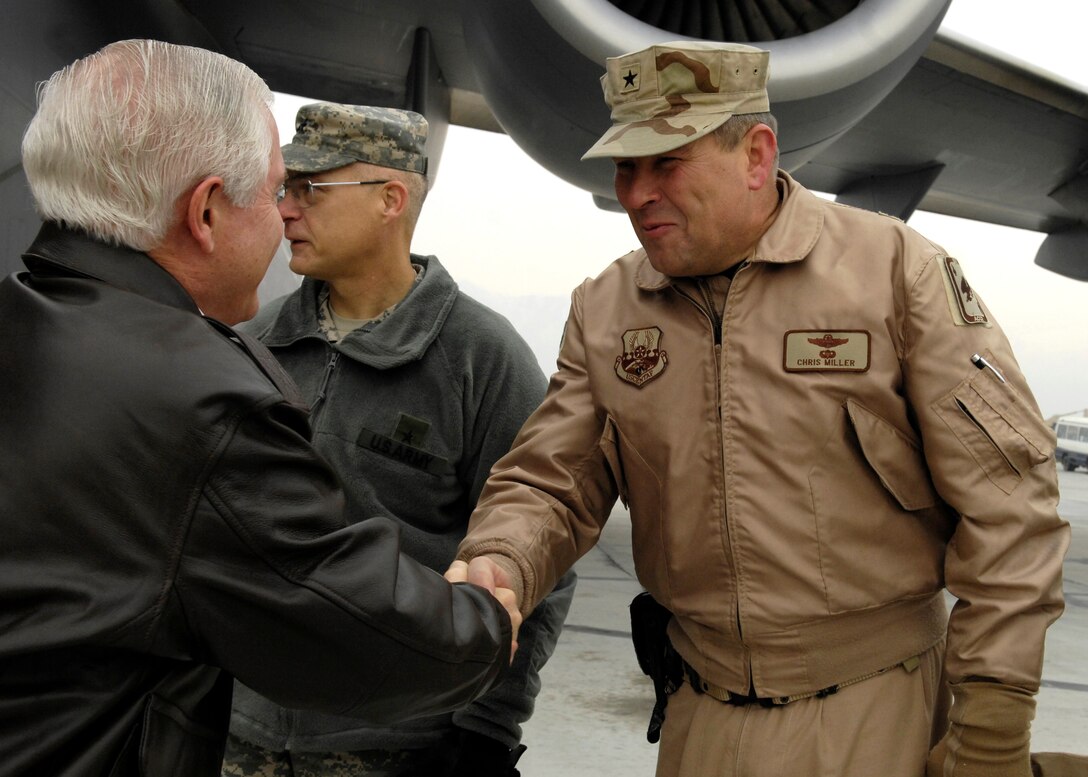 Defense Secretary Robert Gates meets with U.S. Air Force Brig. Gen. Chris Miller upon his arrival at Bagram Air Field, Afghanistan, Jan. 17, 2007.  