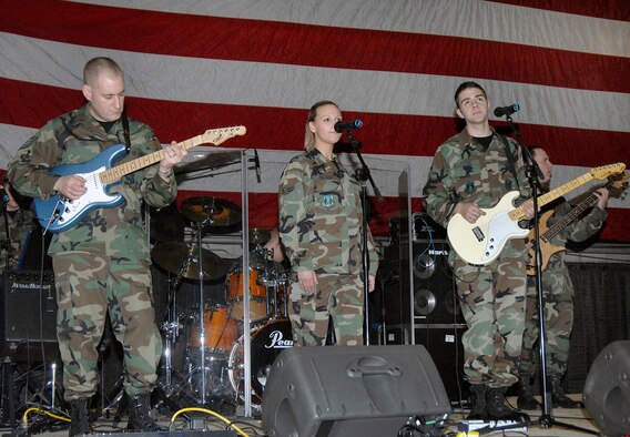 The Air Force Band of Liberty rock ensemble, Afterburner, performs at the Heroes' Homecoming at Hanscom Air Force Base, Mass., Jan. 19. (U.S. Air Force photo/Linda LaBonte Britt)