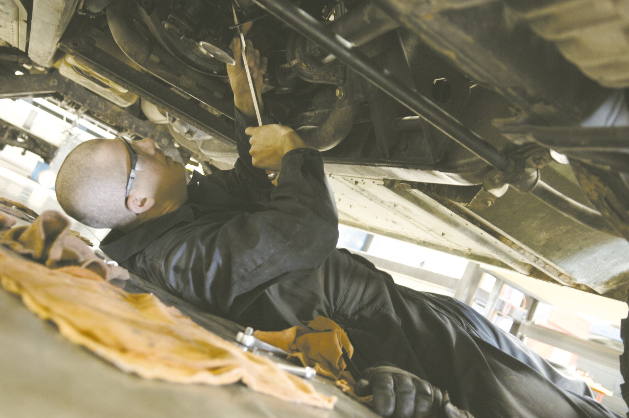 Staff Sgt. James Nelson, 99th Vehicle Maintenance Flight, vehicle maintenance
technician reinstalls a rod bearing after inspecting it for debris. Sergeant Nelson is
trying to diagnose a “ knocking sound” coming from the engine bay during normal
operation. (U.S. Air Force photo/Senior Airman Travis Edwards)