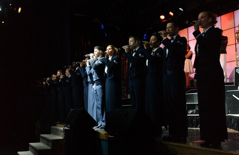 EIELSON AIR FORCE BASE, Alaska --The Tops in Blue world tour 2006 performs "what's love?" in Eielson AFB's Theatre on Jan. 12.  Their performance ushers in lively show tunes, country love, old time favorites, and today's hits in a classic fashion. The Air Force's Expeditionary Entertainers evoke one to reminise the power of love for family, their country, and that 'special someone'.
(U.S. Air Force photo by Senior Airman Rachel Walters)
