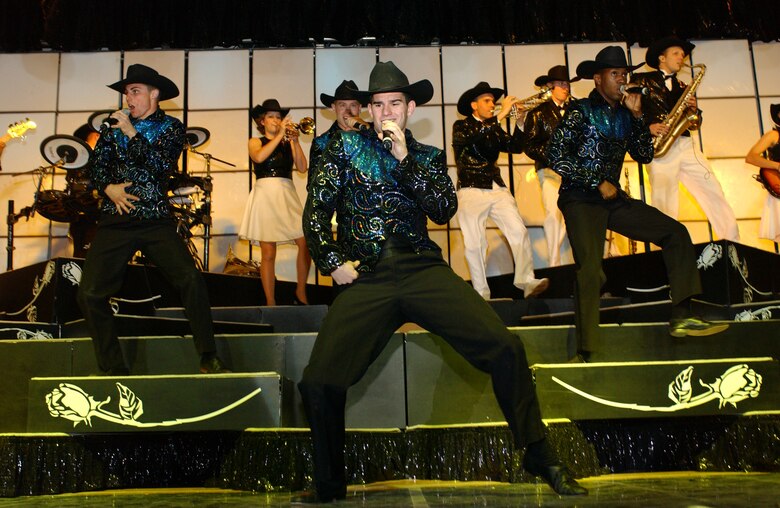 EIELSON AIR FORCE BASE, Alaska --The Tops in Blue world tour 2006 performs "what's love?" in Eielson AFB's Theatre on Jan. 12.  Their performance ushers in lively show tunes, country love, old time favorites, and today's hits in a classic fashion. The Air Force's Expeditionary Entertainers evoke one to reminise the power of love for family, their country, and that 'special someone'.
(U.S. Air Force photo by Senior Airman Rachel Walters)