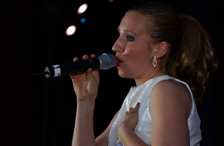 EIELSON AIR FORCE BASE, Alaska --The Tops in Blue world tour 2006 performs "what's love?" in Eielson AFB's Theatre on Jan. 12.  Their performance ushers in lively show tunes, country love, old time favorites, and today's hits in a classic fashion. The Air Force's Expeditionary Entertainers evoke one to reminise the power of love for family, their country, and that 'special someone'.
(U.S. Air Force photo by Senior Airman Rachel Walters)