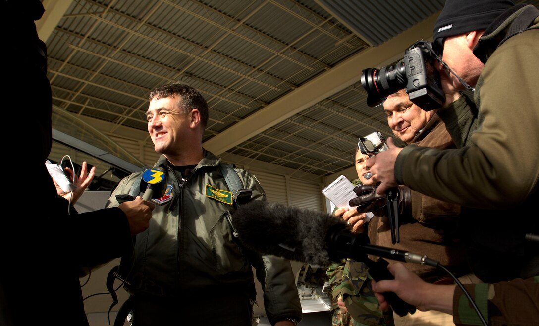 1st Fighter Wing Commander Brig. Gen. Burton Field, is interviewed by members of the local media on Jan. 19, 2007 after delivering the fortieth F-22A Raptor from the factory at Lockheed Martin in Marietta, Ga., to the 1st Fighter Wing at Langley AFB. The delivery of this mighty aircraft marks the completion of delivery from the factory to the installation. (USAF Photo by Staff Sgt Samuel Rogers)