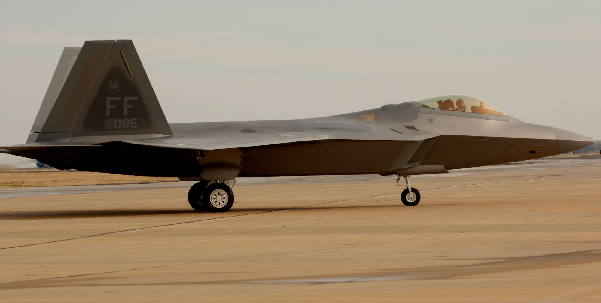 1st Fighter Wing Commander Brig. Gen. Burton Field, taxi's down the runway in the 40th F-22A Raptor delivered  from the factory at Lockheed Martin in Marietta, Ga., to the 1st Fighter Wing at Langley AFB in Virginia on Jan. 19, 2007. The delivery of this mighty aircraft marks the completion of delivery from the factory to the installation. (USAF Photo by Staff Sgt Samuel Rogers)